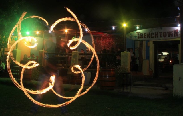 Duncan Greenwood performing in-spin flower patterns with fire flower sticks - slow shutter photography. - Flow DNA